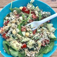 My favorite spinach salad with extra avocado and mixed seeds. at Milk Away in Sevilla