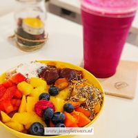Fresh Açaí bowl and fruit juice at Milk Away in Sevilla