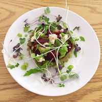 Cashew Basil Raw pizza! So good and SO PRETTY. at Purple Sprout Conscious Organics in Buffalo Grove