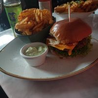 Vegan cheese burger with vegan bacon, waffle fries and vegan coriander lime mayo at Franz & Willi in Weimar