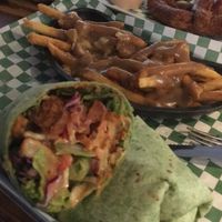 Spicy Tiger Wrap with veg Poutine Fries  at The Ice Haus in Murray