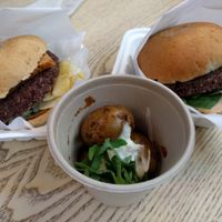hammer and plant burgers with side potatoes at The Plant in Stockholm
