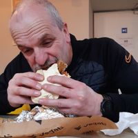 My dad probably wouldn't be too happy that I shared this sneaky quick photo of him gorging on his Aloha haha =P" at Vegab in Krakow