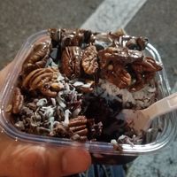 Some custom creation by the staff. Chocolate, coconut, and pecan acai bowl. Very yummy at Utopia Juice Bar in Pompano Beach