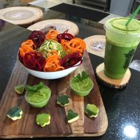 Zucchini Spaghetti and a fresh pressed Eden Greens drink.  at Utopia Juice Bar in Pompano Beach