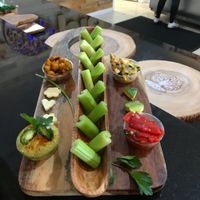 Vegan selection - chickpea curry,  Artichoke with pesto, roasted red peppers and homemade Spicy Homus! at Utopia Juice Bar in Pompano Beach