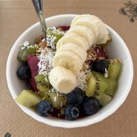 Bowl with fruit and granola. Delicious and light, big portion   at Ginger in Rome