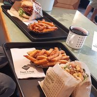 Cheeseburger, hash brown wrap, and sweet potato fries at Swing Kitchen - Operngasse in Vienna
