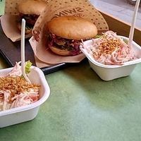 Burgers with coleslaw salad  at Swing Kitchen - Operngasse in Vienna