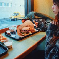 Vegan Cheeseburguer and Onion rings  at Swing Kitchen - Operngasse in Vienna