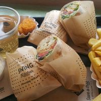Wraps, fries, nuggets and juice at Swing Kitchen - Operngasse in Vienna