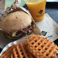 Cheese burger, sweet potato fries and OJ ❤️ at Swing Kitchen - Operngasse in Vienna