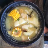 Ajiaco, a Colombian soup. Comes with a side place of rice, avocado and a small bowl of capers.  at ExotiK in Newtown