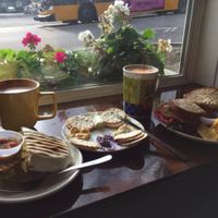 cheesy potato burrito, cream cheese plate, 701 sandwich, and coffee at 701 Coffee in Seattle