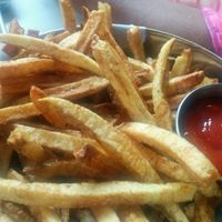 deliciously crunchy basket of fries with ketchup at Gnome Cafe in Charleston