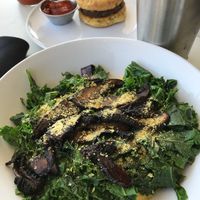 Yummy breakfast of kale and cheese grits!  Breakfast is served all day! at Gnome Cafe in Charleston
