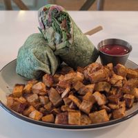 Veganized 705 Wrap with home fries at The Magnolia Cafe in Palatka