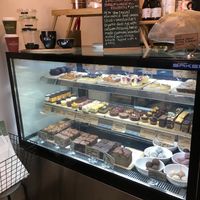 Cake cabinet at The Organik Store in Glenelg