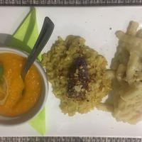 Fusilli cacio e pepe, saffron risotto, carrot and ginger velouté at Vibrazioni Vegetali in Abbiategrasso
