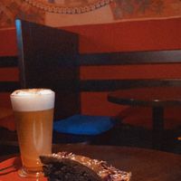 Vegan cake and latte  at Bonobo in Krakow