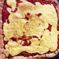 vegan cheese on brown flour pizza at Amor Infinito in Montanita