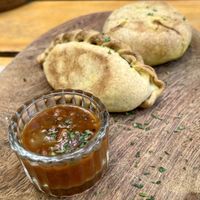 Tofu samosa + Broccoli and sweetcorn samosa with tomato chutney   at La Cocina de Daksha in Tigre