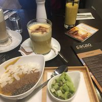 Mango Superfood Bowl without granola, Tropical Smoothie and Golden Milk   at cacao in Prague