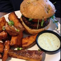 classic burger (vegan) with side of sweet potato fries at Mildreds - Camden in North West London