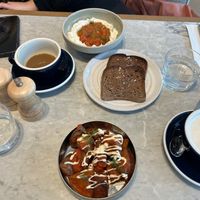 Patatas bravas on the bottom there. Whipped feta dish with gluten free bread up top.  at Mildreds - Camden in North West London