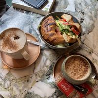 chai latte with oat milk, "Le VG" bagel without the cheese, cappucino with oat milk   at La Ronronnerie in Nice
