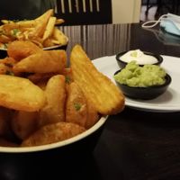 Potato wedges with guacamole at Space Burger in Dusseldorf