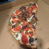 Shaganappi with vegan mozzarella and Beyond sausage crumbles at The Village Flatbread Co. in Calgary