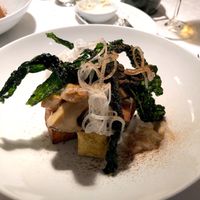 Main course: Baked celeriac, chickpea fritter, tuscan kale, king oyster. at Brasserie Godot in Stockholm