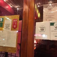 Front window  and V Poster  at Bay Hong in Darlinghurst