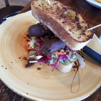 Sausage and 'bacon' sandwich at Bach on Breakwater in New Plymouth