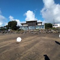 At the beach looking back at the Cafe at Bach on Breakwater in New Plymouth