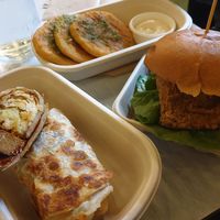 Eggy roll w/italian Beyond sausage $17.00, Garlic butter potato cake $11.00, Zinger chikn burger $17.00 at Woking Amazing in Northcote