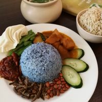 Nasi Lemak. Note the curry is not vegan as they mock meat has eggs in them. They gave us potatoes instead but after I finished my meal I found out they didn't cook the potatoes separately. I guess my chat with them got lost in translation... Perhaps I can ask for more vegetables next time or ask to cook one separately  at Love Earth Cafe in Kepong