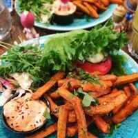 Burger plate; soy burger, salad, sweet potato fries, chili mayo. (Sonny angels not included!) at Mahalo - Hornsgatan in Stockholm