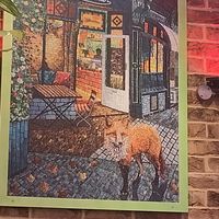 Picture of the cafe not sure who the artist is at The Bristolian in Bristol