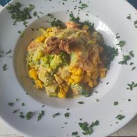 Kürbis-Spätzle mit Brokkoli, Rahmsauce und karamellisierten Zwiebeln at GustaV in Salzburg