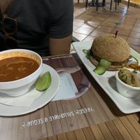 Tortilla soup and vegan burger  at 100% Natural in Cancun