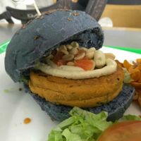 Peanut and chickpea burger in red onion bread at Vegana Burgers - Atrium Saldanha in Lisbon