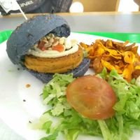 Peanut and chickpea burger with sweet potato chips and salad at Vegana Burgers - Atrium Saldanha in Lisbon