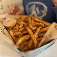 Side of fries with sauce   at Homegrown Smoker in Portland
