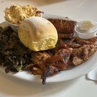 Combo plate - tempeh, Chick’n, greens, coleslaw and bread roll  at Homegrown Smoker in Portland