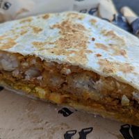 half of a Brunchwrap at Homegrown Smoker in Portland