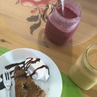 Smoothies and red berries cake. at Alcachofra Cafe in Faro