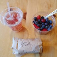 Vegan breakfast burrito!  Kombucha, and a fruit cup! 🙌   at Oryana Natural Foods Market in Traverse City