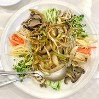 yangjangpi as appetizer ( clear sheet noodles under veggies and a light Chinese mustard dressing ).  at Shindongyang - 신동양반점 in Seoul